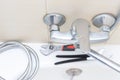 Shower water tap faucet repair, calcified shower hose with limescale replacement in bathroom