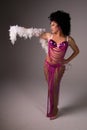 Showgirl in pink costume. Royalty Free Stock Photo