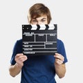 Showing a clapboard