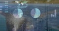 Showing dashboard overlaying seascape at sea, with world map, charts, percent readouts, rigging Royalty Free Stock Photo