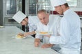 Showing dessert to chef Royalty Free Stock Photo