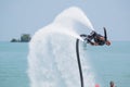 Showing flyboard on Ao Makham during Children`s day in Phuket, T