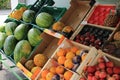 Showing the fresh fruit for sale outside the store.