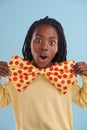 Showing his funny side. Cropped view of a preteen boy wearing a humorous bow tie.