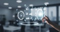Human hand touching a glowing digital interface displaying user profiles and financial data charts in a blurred Royalty Free Stock Photo
