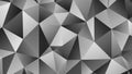 Monochromatic Geometric Polygonal Faceted Background Pattern With Sharp Edges and Varying Shades of Gray and White Creating a Royalty Free Stock Photo