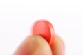 Showing a red pill Royalty Free Stock Photo