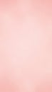 Soft pastel pink textured background with a subtle gradient and a gentle, diffused light creating a smooth and calming abstract Royalty Free Stock Photo