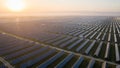 Vast Solar Panel Array Under a Hazy Sunrise Sky (2300) stock Royalty Free Stock Photo