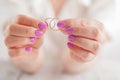 Showing wedding rings. Love theme Royalty Free Stock Photo