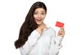 Showing woman presenting blank gift card sign