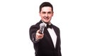 The Showman interviewer. Young elegant man holding microphone Royalty Free Stock Photo