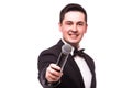 The Showman interviewer. Young elegant man holding microphone against Royalty Free Stock Photo