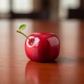 Shows a cube shaped glossy red fruit resembling an apple with a Royalty Free Stock Photo