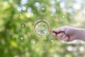 Shows a magnifying glass as a smart home surveillance Royalty Free Stock Photo