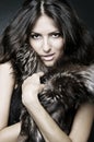 Showy brunette in furs Royalty Free Stock Photo