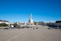Shoy of Fatima in Portugal featuring a square bustling with people in front of the Fatima church