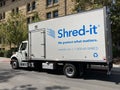 Shred-it truck parked at client office building. Shred-it is an information security solution provided by Stericycle Inc - San