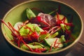 Beetroot and lettice salad in a green bowl