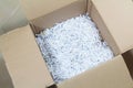 Shredded paper in a cardboard box Royalty Free Stock Photo