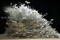 Shredded paper on dark background. Concept of recycle and office work of confidential. Waste paper recycling, giving paper the Royalty Free Stock Photo