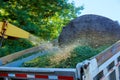 Shredder chipper at work for tree branches Royalty Free Stock Photo