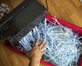 Shredding documents for security. Top view Royalty Free Stock Photo