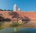 Hindu temple reflection in pond - Ponda, Goa, India.