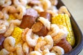 A Shrimp Bake with Sausage Corn on the Cob and Potatoes Baked Together with Southern Cajun Seasonings