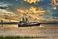 A shrimp boat entering Charleston, South Carolina harbor. Royalty Free Stock Photo