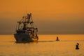 Shrimp Boat at sunset in the gulf Royalty Free Stock Photo