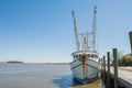 Shrimp boat tied to pier Royalty Free Stock Photo