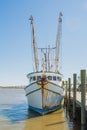 Shrimp boat tied to pier Royalty Free Stock Photo