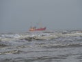 Shrimp boats in big waves on the North Sea Royalty Free Stock Photo