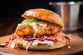 shrimp burger on brioche bun with spiced mayo and coleslaw Royalty Free Stock Photo