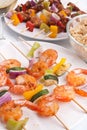 Shrimp, chicken and vegetables kebabs