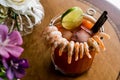 Shrimp Cocktail with red sauce, lime and ice. Royalty Free Stock Photo