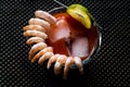 Shrimp Cocktail with red sauce, lime and ice. Royalty Free Stock Photo