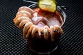 Shrimp Cocktail with red sauce, lime and ice. Royalty Free Stock Photo