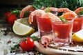Shrimp cocktail in small glasses, cherry tomatoes, dill, parsley Royalty Free Stock Photo
