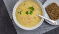 Shrimp and corn chowder with bread - top view with copy space Royalty Free Stock Photo