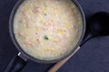 Shrimp and corn chowder - Top view of fish and corn soup with space for text Royalty Free Stock Photo