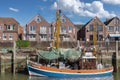 Shrimp cutter in fishing harbor in Neuharlingersiel