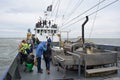 Shrimp fishery ship on sea with tourist passangers during bad weather