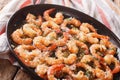 Shrimp in garlic sauce with parmesan cheese and herbs in a pan c Royalty Free Stock Photo