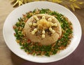 Shrimp lotus seed cakes on fried rice with sauteed onion on whit Royalty Free Stock Photo