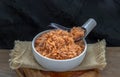Shrimp paste with Dried shrimps in white Ceramic Bowl on brown gunny sack. Copy space, Selective focus