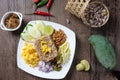 Shrimp paste rice with caramelized pork condiment, dried shrimp, green mango, chilies, lime, shallot , cucumber.