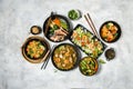 Shrimp salad, fish with vegetables, tom yum, rice with seafood, Asian noodles. Famous Chinese cuisine dishes on table. Top view. Royalty Free Stock Photo