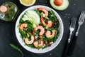 Shrimp salad with fresh green arugula leaves and avocado, radicchio, almond and sesame seeds Royalty Free Stock Photo